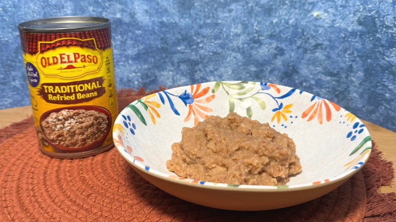 Can and bowl of refried beans