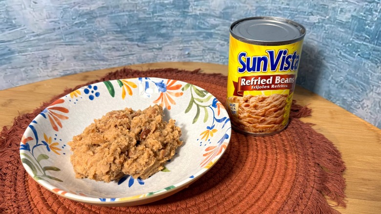 Can and bowl of refried beans