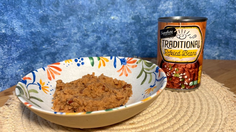 Can and bowl of refried beans
