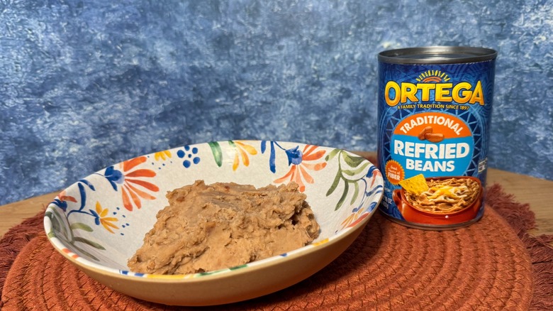Can and bowl of refried beans