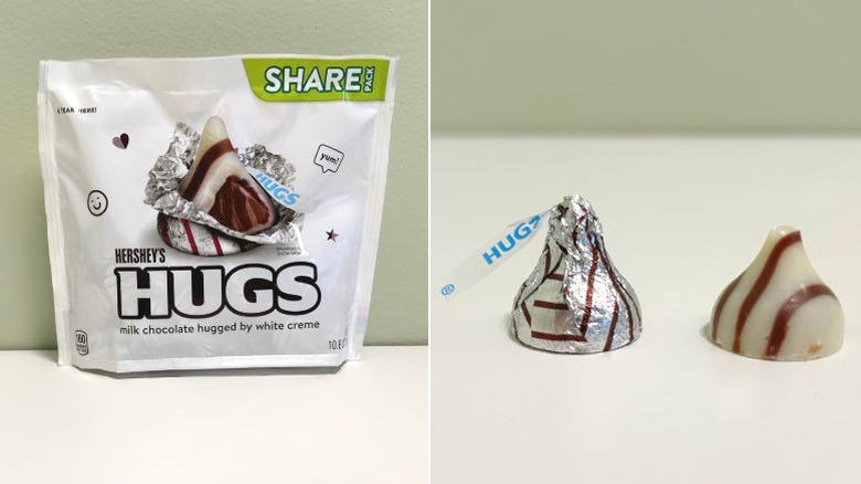 A bag of Hershey's Hugs Milk Chocolate Hugged by White Creme beside two kisses, one wrapped and one unwrapped