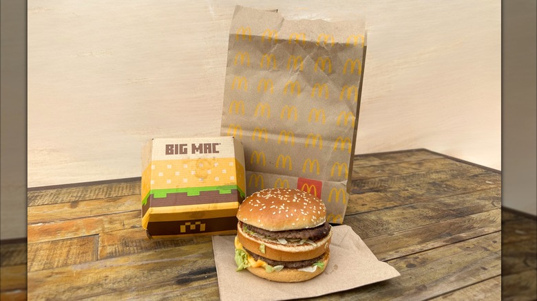 A McDonald's Big Mac double patty burger with a sesame seed bun and lettuce