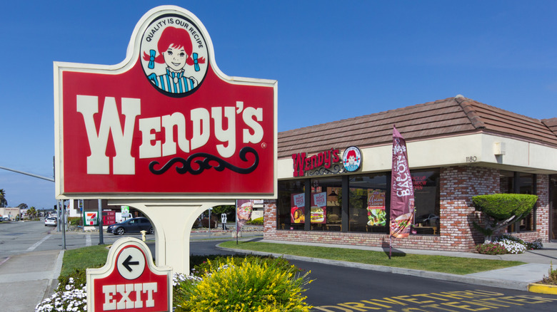 Modern Wendy's logo featuring the red-headed mascot