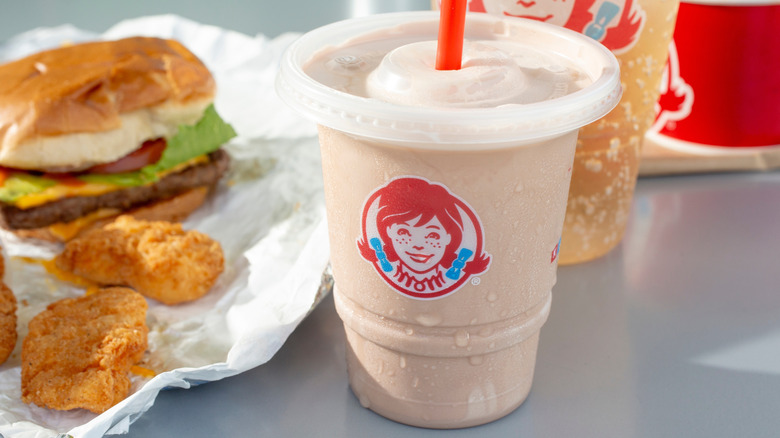 Wendy's combo meal featuring a burger, chicken nuggets, and Frosty
