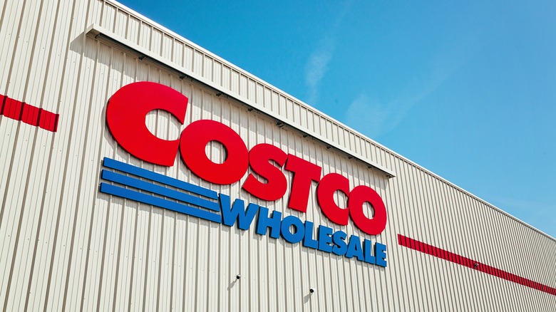 Costco wholesale store sign on the side of a building