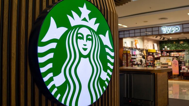 starbucks logo on wall