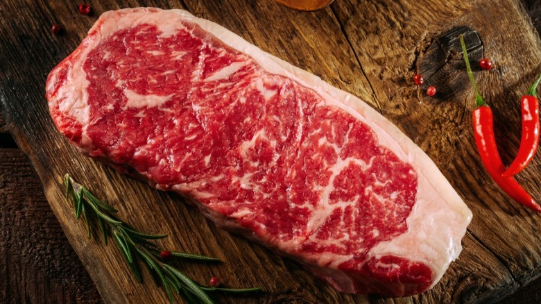 Raw New York strip steak