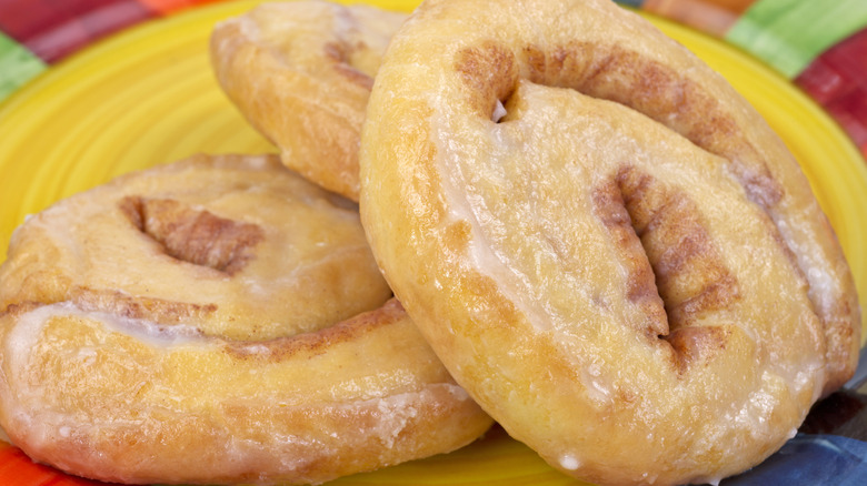 Honey buns on colorful plate