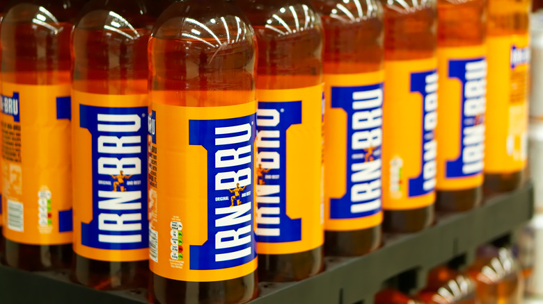 Bottles of Irn-Bru on a grocery store shelf