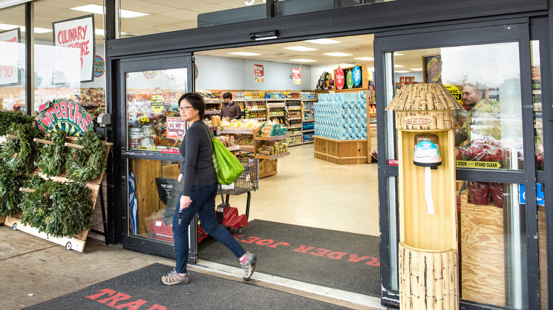 Person in front of Trader Joe's entrance