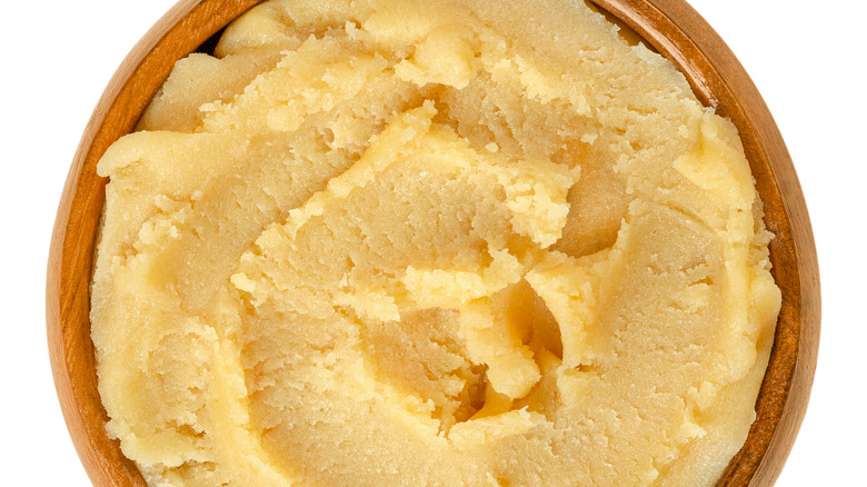 Bowl of almond cream close up 