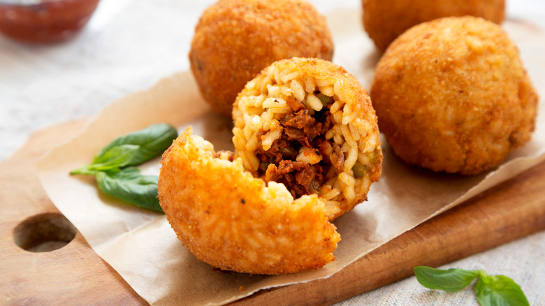Arancini on wood board