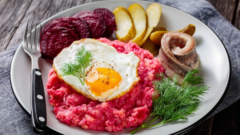 corned beef with egg, beets, and herring