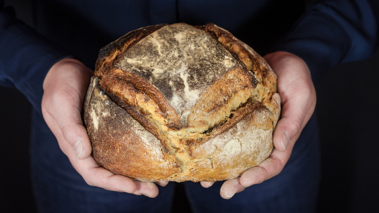 Hands holding Pain de Campagne