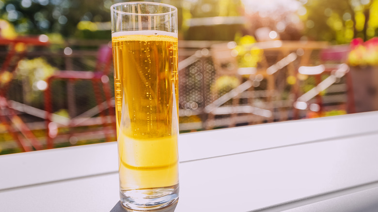 tall glass of light beer