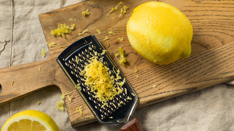 Fresh lemons and lemon zest
