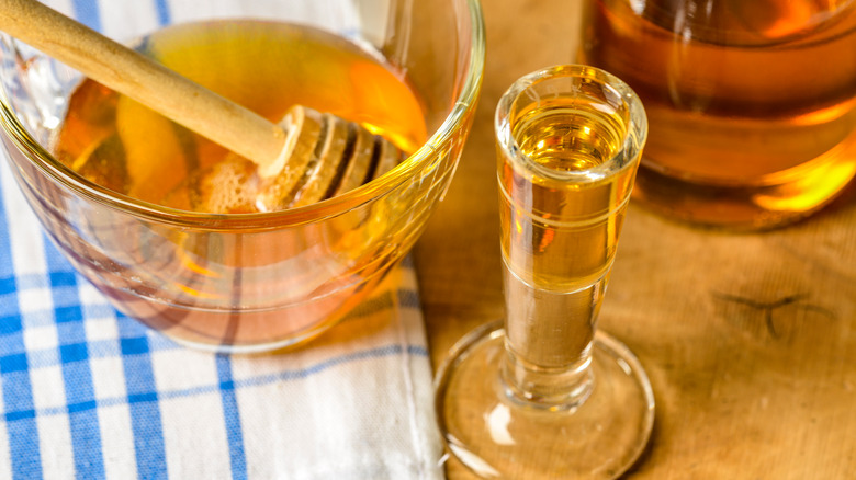honey next to small glass of mead