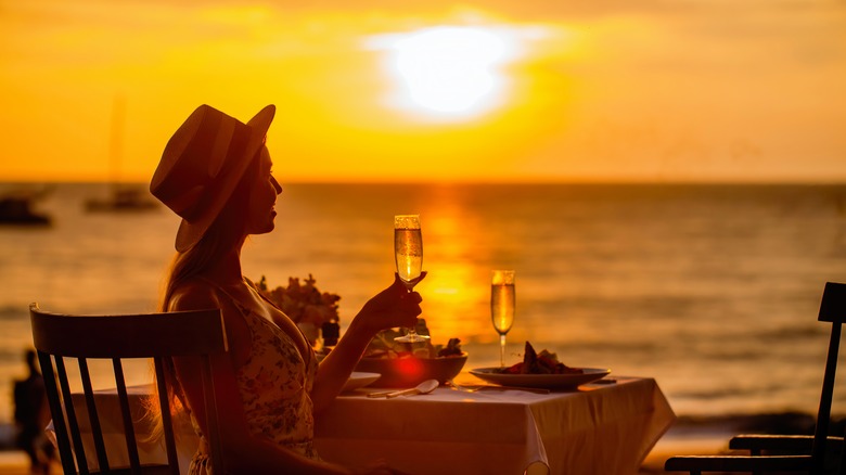 Woman on her honeymoon at sunset