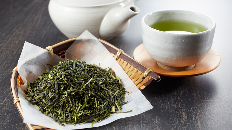 loose sencha tea with teacup