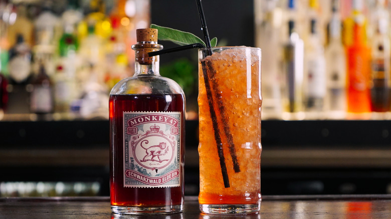 Sloe gin next to cocktail