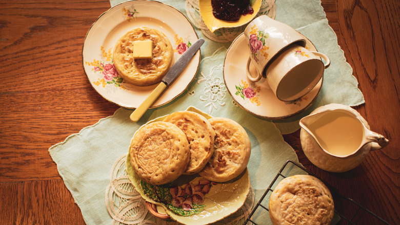 plates of tea and crumpets