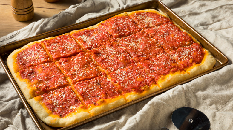 Philadelphia-style tomato pie with grated cheese