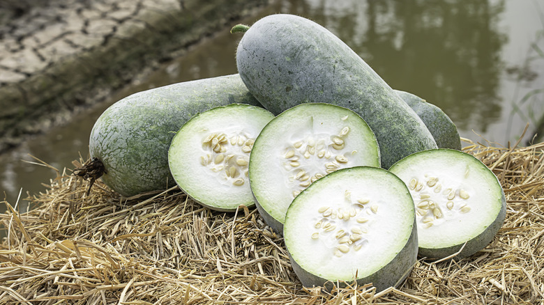 sliced winter melon on straw