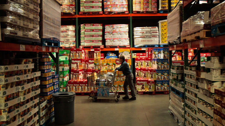 Costco shopper pushing cart