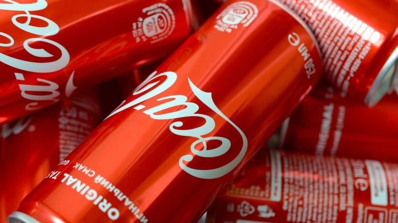 Cans of Coca-Cola