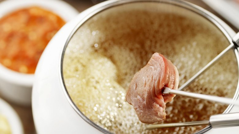 Meat in fondue pot