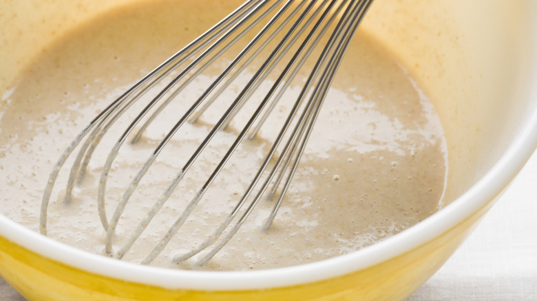 Pancake batter in a bowl.