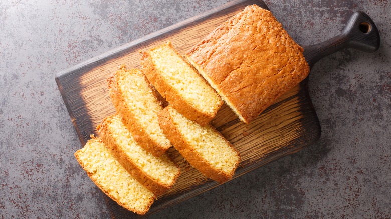 Sliced pound cake on cutting board