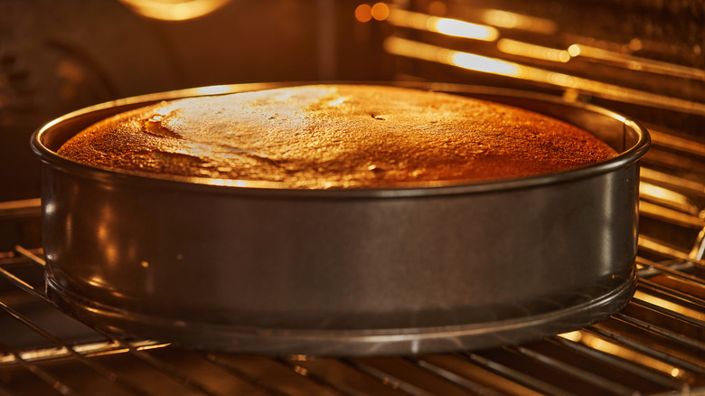 Cake baking in an oven