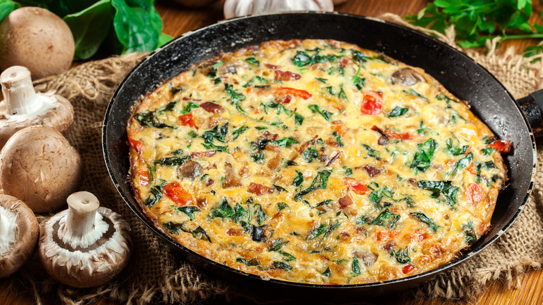 Frittata in pan on table