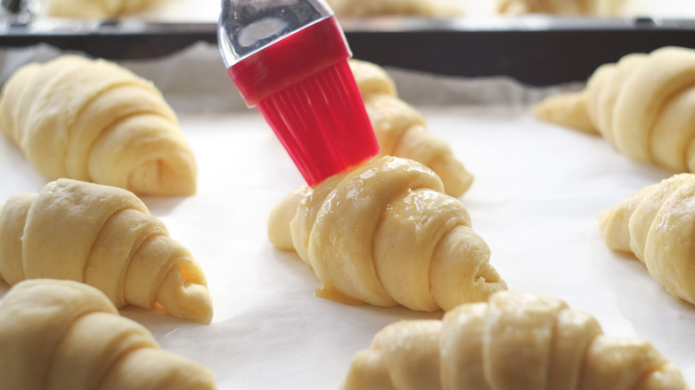 pastry brush coating crescent rolls