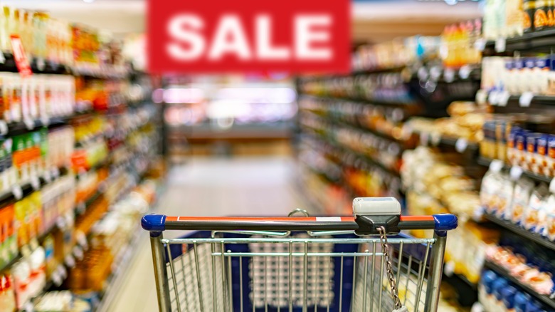 Sale sign in grocery aisle