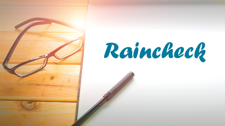 Raincheck on pad with pen