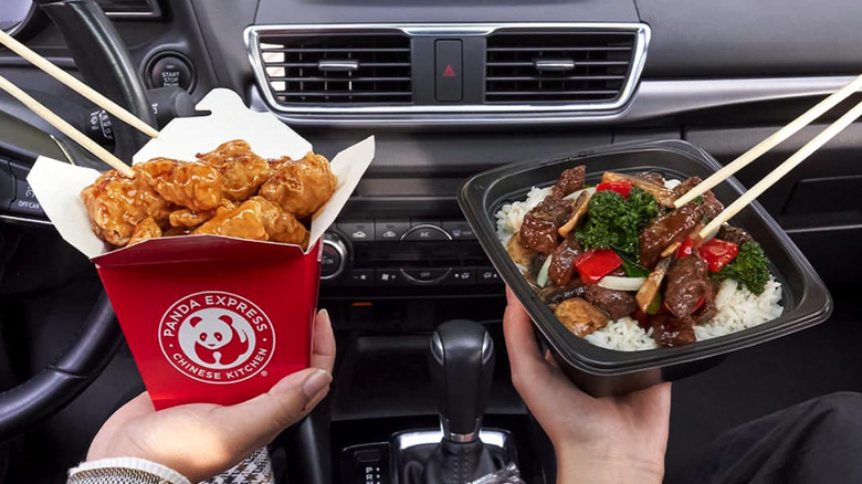 People holding Panda Express meals
