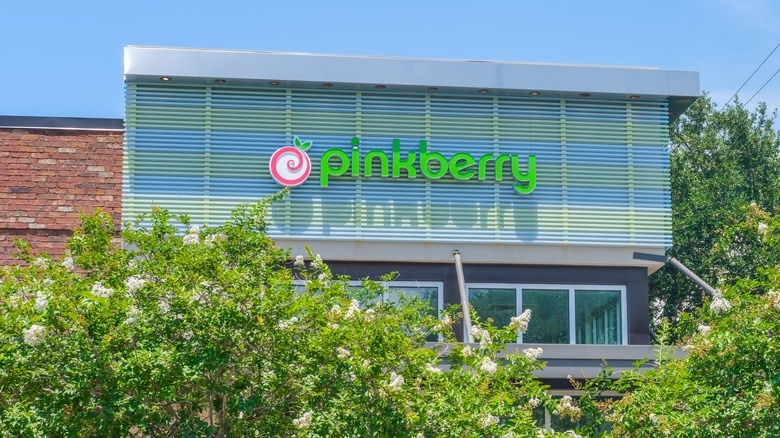 blooming trees outside Pinkberry store