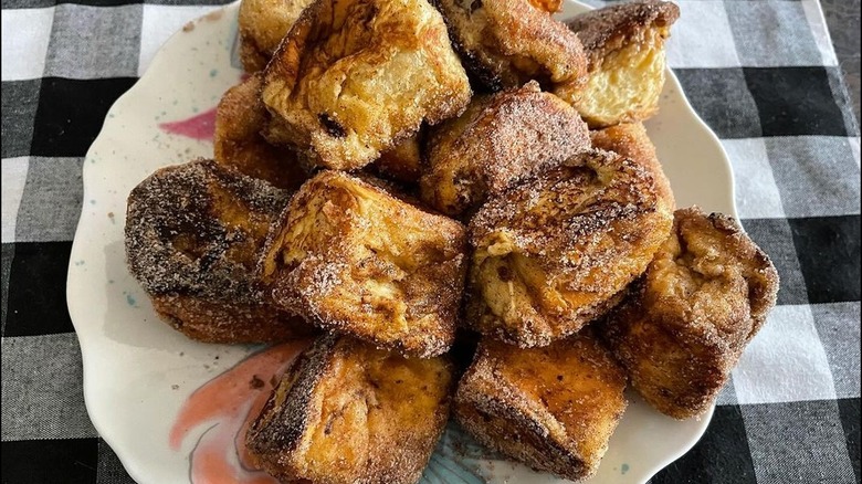 plate piled with Hawaiian roll French toast