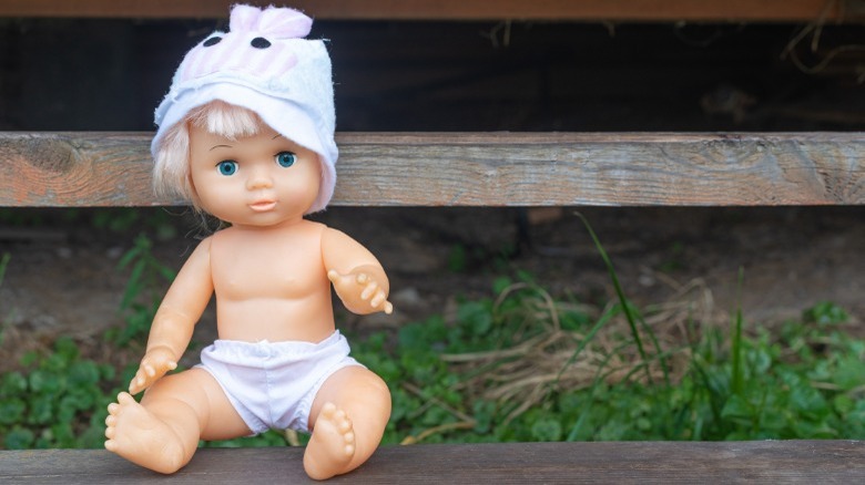 A kewpie doll sat down