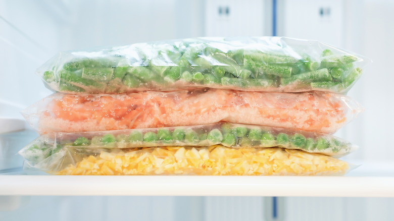A small stack of vegetables in the freezer
