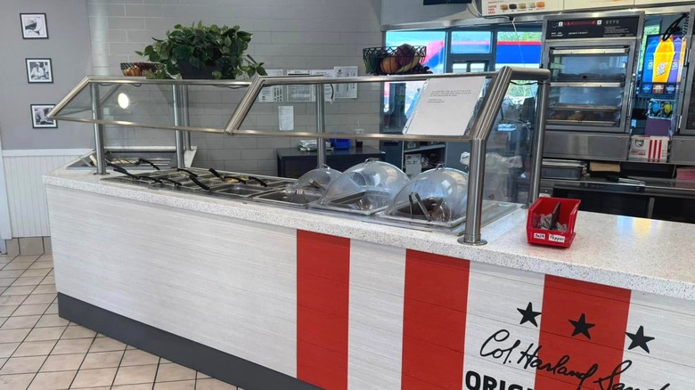 View of KFC buffet with kitchen in the background