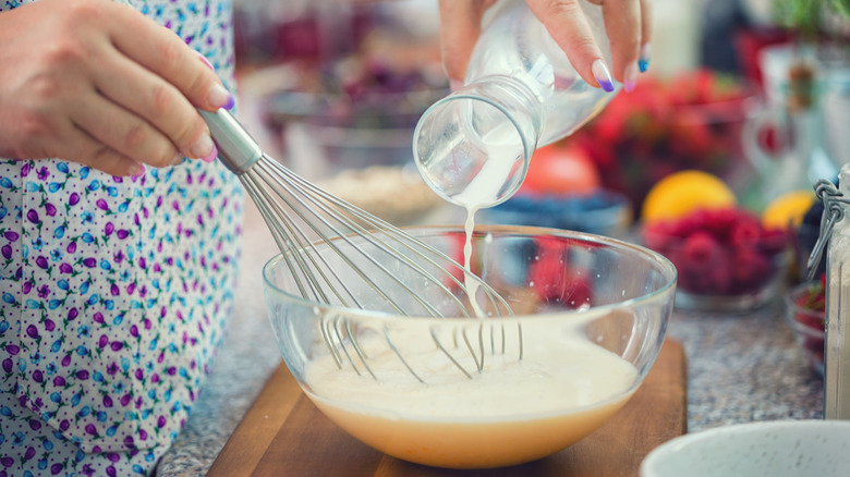 person making pancakes