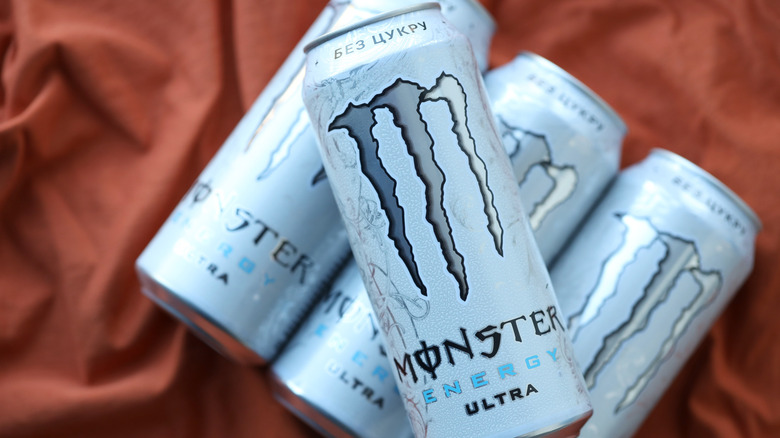 Monster Energy Drink ultra on fabric background