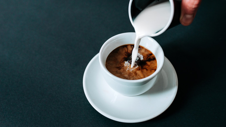 Creamer added to coffee