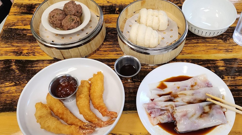 Dim sum dishes including dumplings, meatballs, shrimp tempura, and rice from Hong Kong Spirit Food, in Anchorage, Alaska