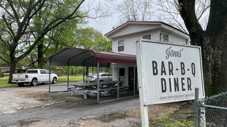 A sign in front of the quaint Jones Bar-B-Q Diner in Marianna, Arkansas proudly proclaims it a Jones family business since 1910.