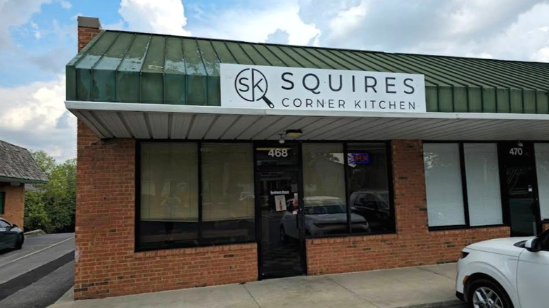 The outside of Squire's Corner Kitchen in a small brick building in Lexington, Kentucky.