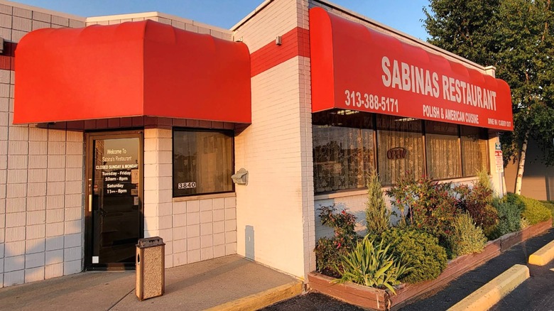 A red awning announces Sabina's Restaurant in Melvindale, Michigan as Polish and American Cuisine for dine in or take out.